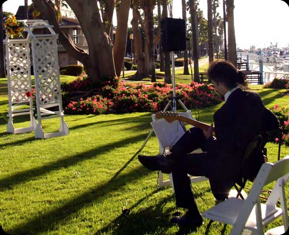 outdoor wedding guitarist